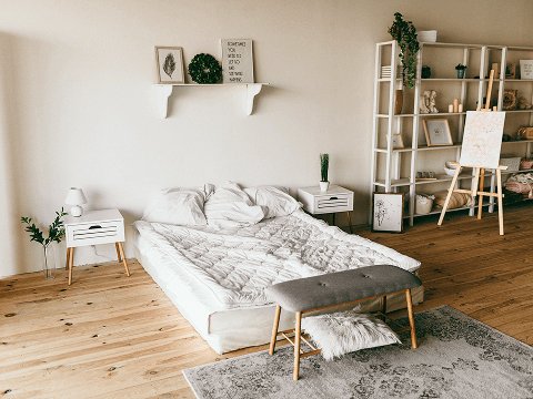 Minimal bedroom interior design in Canada with soft tones and decor